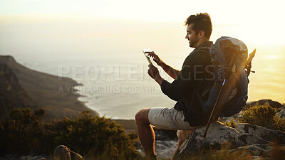 Buy stock photo Man, hiking and search with tablet on mountain sunset or cliff for navigation app in nature. Male person, hiker or browsing with technology, backpack or equipment for trekking route or location