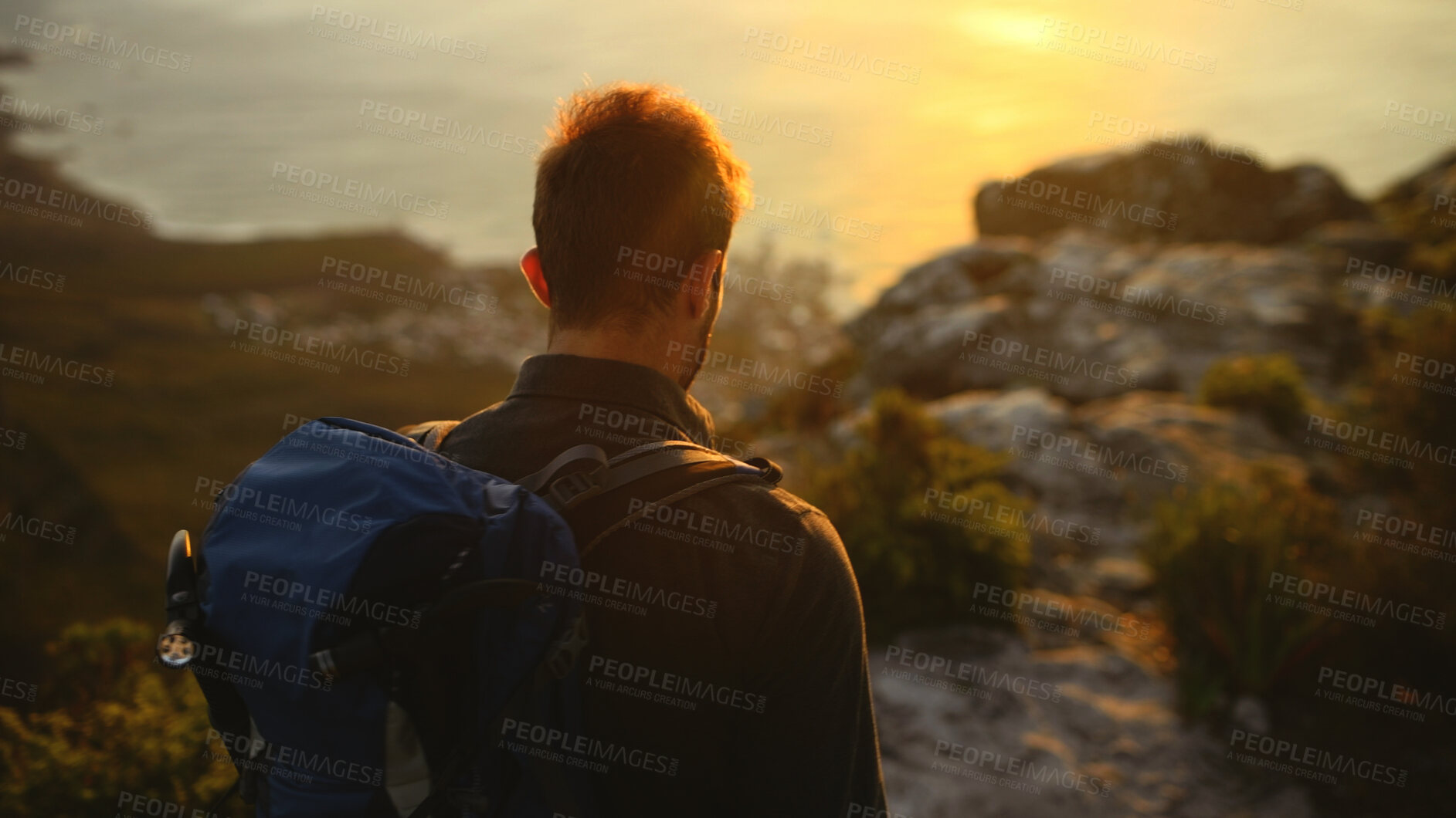 Buy stock photo Man, back and sunset on mountain for countryside, travel or adventure to explore nature. Relax, person and journey with natural environment for hiker, hobby and tourism for sightseeing or view