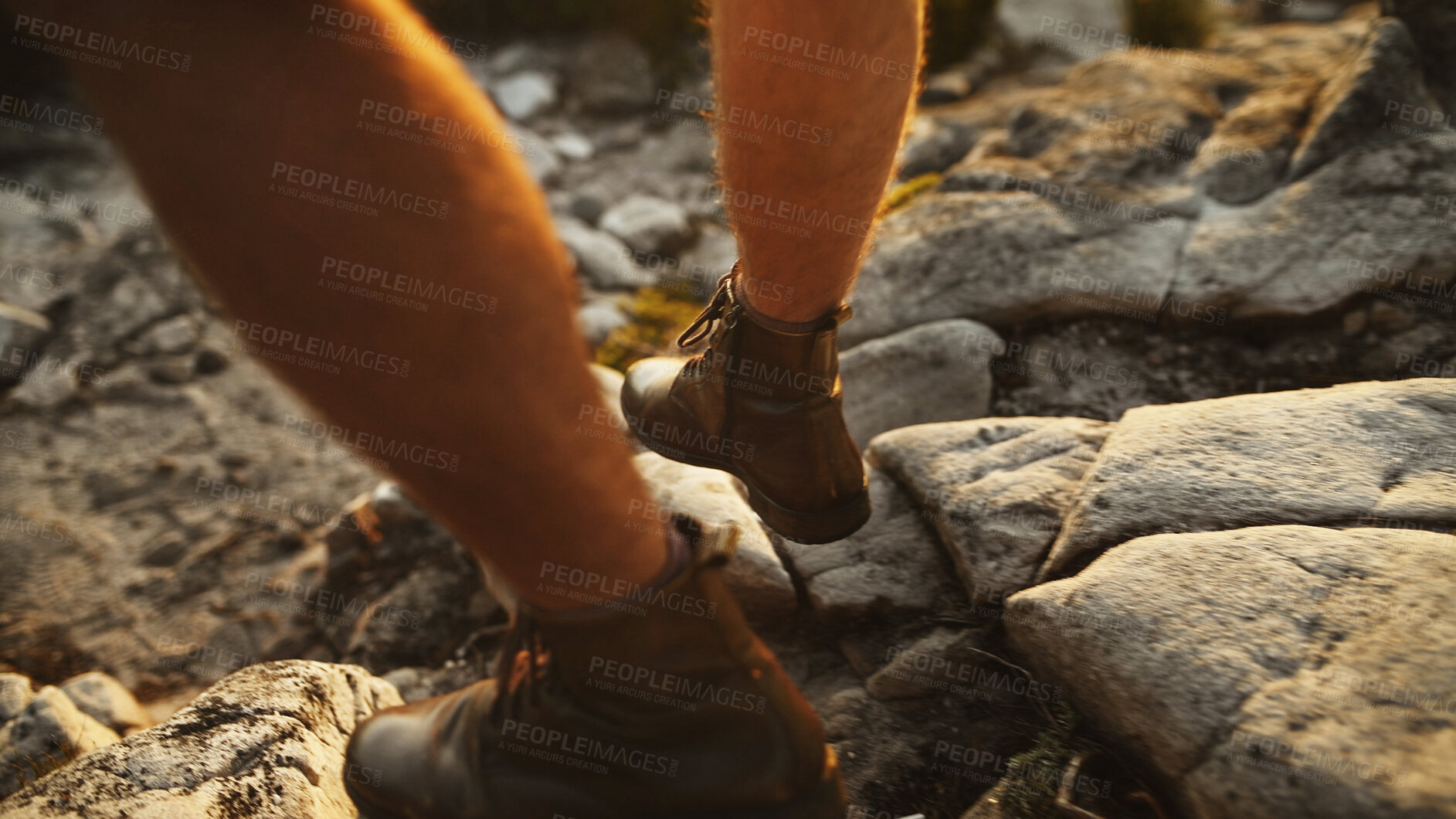 Buy stock photo Legs, person and hiking by rocks for travel, vacation trip and holiday on adventure in nature. Walking, shoes and hiker trekking on mountain for exploration, tourism and journey for hobby outdoor