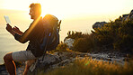 Man, hiking and mountain with search on with tablet, ocean or sunset with digital map in summer. Person, scroll and touchscreen by sea, cliff and application for direction with trekking in Spain