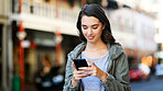 Typing, internet and woman in city, cellphone and message to contact, texting and email. Outdoor, journey and person with cellphone, social media or digital app with communication, reading and travel