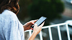 Hands, woman and typing with phone outdoor for text message, social networking and email response. Connection, person and smartphone screen on balcony for online research, internet browsing and chat