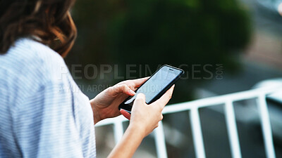 Buy stock photo Hands, woman and typing with phone outdoor for text message, social networking and email response. Connection, person and smartphone screen on balcony for online research, internet browsing and chat