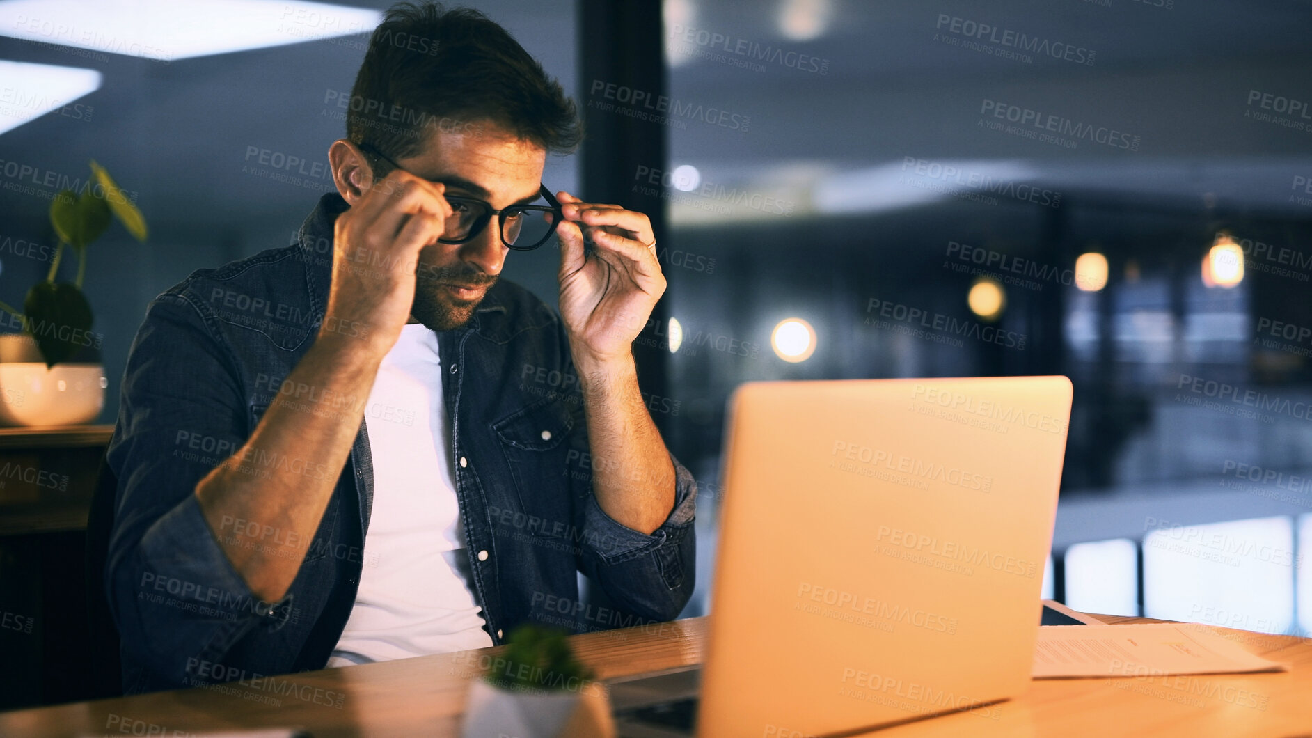 Buy stock photo Night, glasses and man on laptop for proofreading draft, update and deadline for news article. Project, creative and journalist in overtime for blog website, story research and online publication