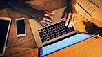 Above, evening and man with laptop, hands and typing with email for creative project. Closeup, night or writer with pc, notes or feedback for proposal, proofreading article or editor with news report