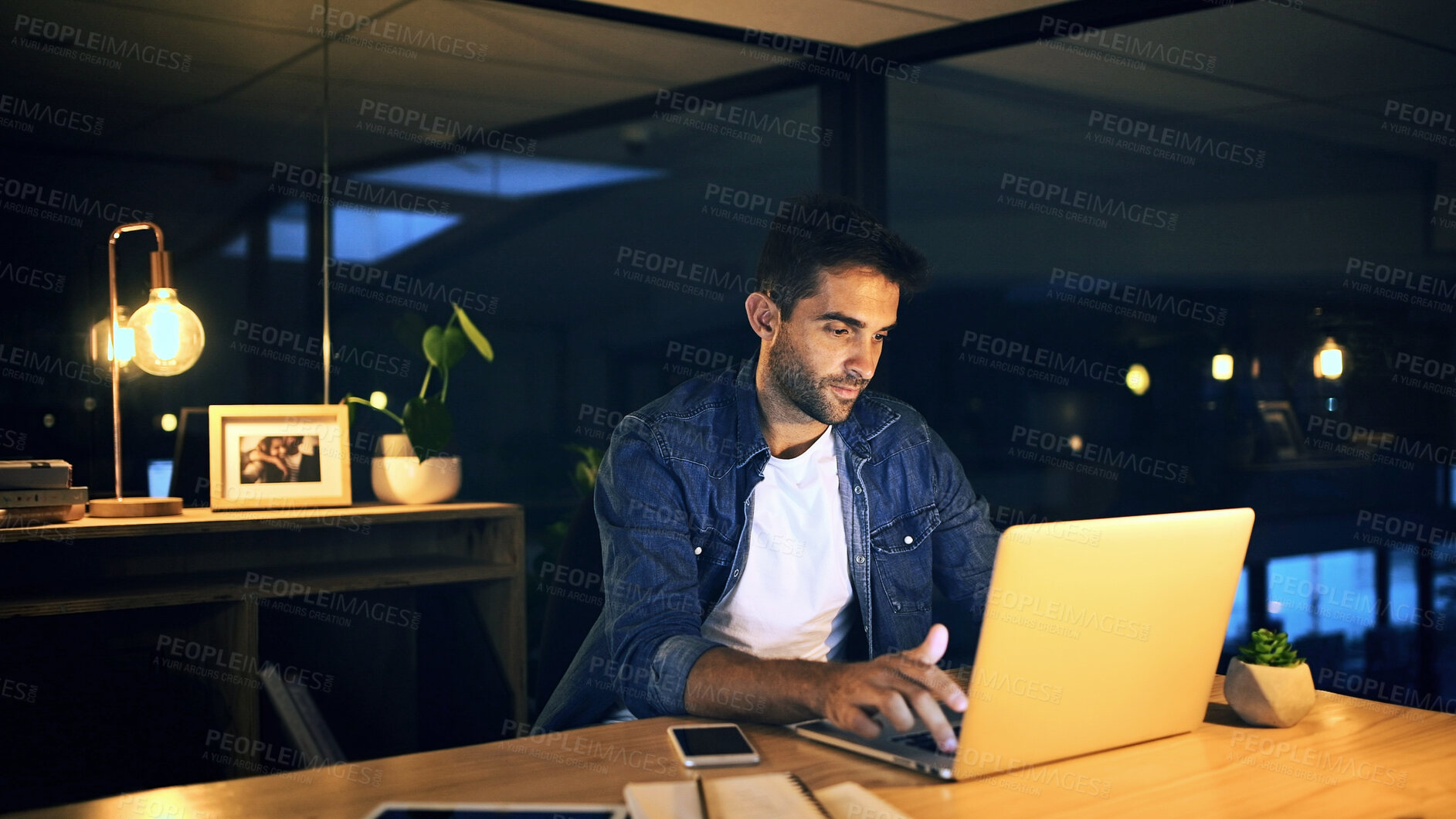 Buy stock photo Office, night and businessman with laptop for typing, proofreading and deadline for news article. Late, male person and journalist with digital for blog website, editing story and online publication