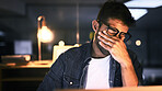 Tired, overworked and man with laptop, night and working late for web design, employee and thinking. Burnout, brand designer and person with tech for deadline, contemplating and stress for project