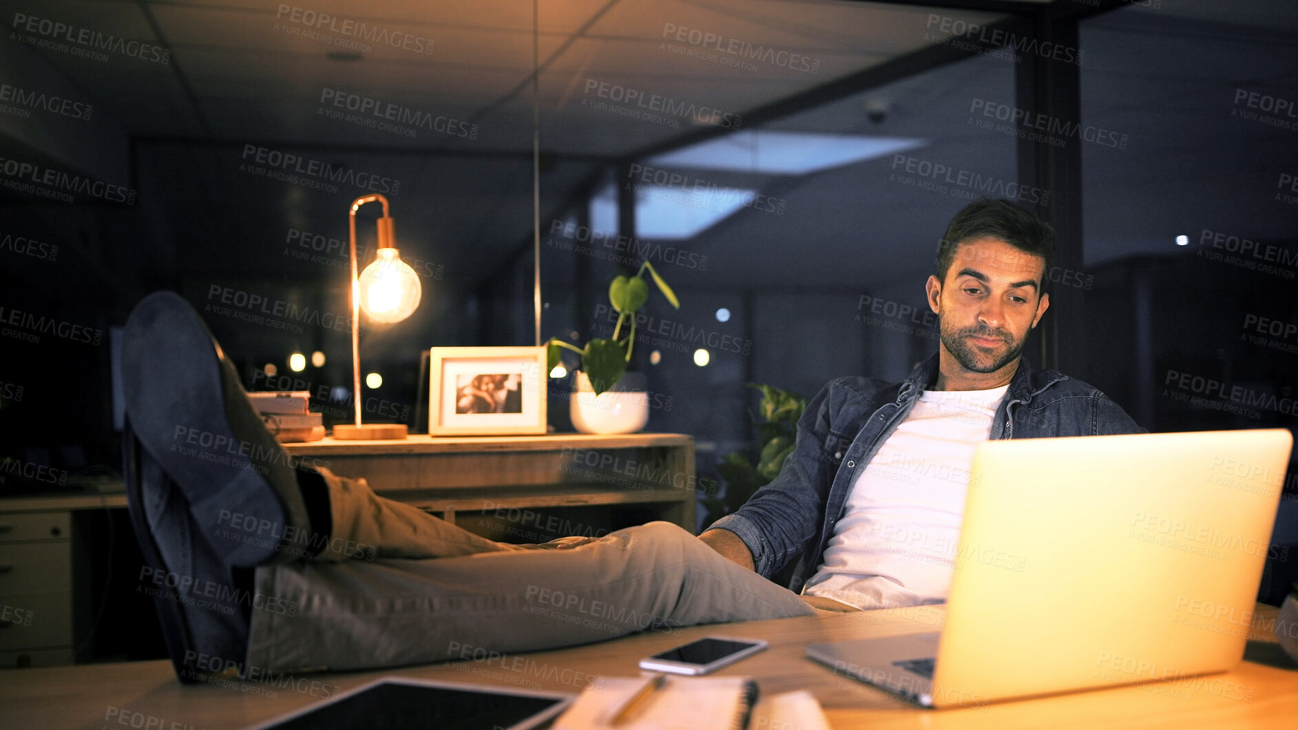 Buy stock photo Laptop, tired and businessman in office for research, copywriting deadline or night project. Bored creative worker, writer or editor relax with overtime, low energy or break for news article online