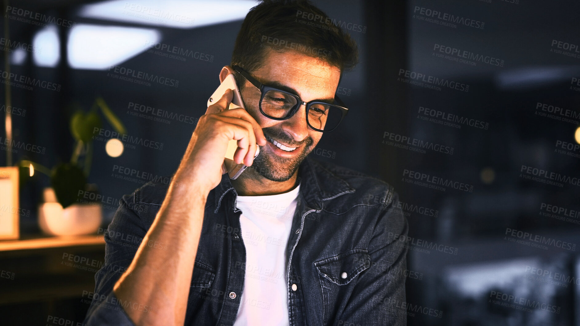 Buy stock photo Phone call, smile and business man in night office for research, copywriting deadline or project. Creative worker, communication and editor for overtime, report or update for news article online