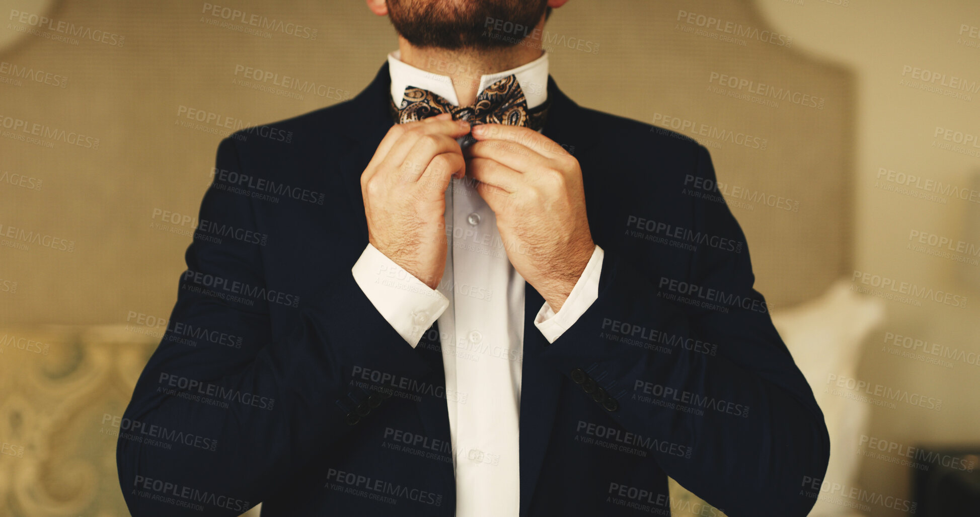 Buy stock photo Wedding, fashion and hands of man with bow tie getting ready for event, ceremony and celebrate. Marriage, preparation and groom dressing in home with smart clothes, formal suit and classy style
