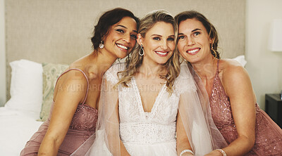 Buy stock photo Bride, bridal party and portrait of women on wedding day with happiness, care and glamour on bed. Bridesmaids, hug and friends smile together for celebration, ceremony and support in dressing room