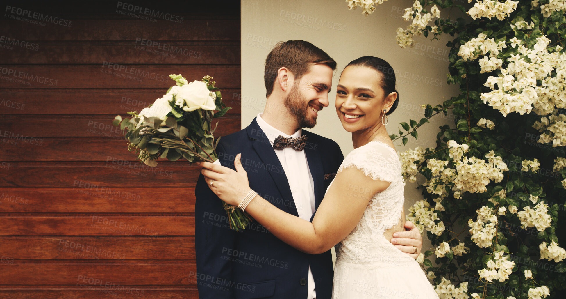 Buy stock photo Wedding, marriage and couple with hug outdoor for special event, milestone and celebration. Relationship, happy people or portrait by home for reception, commitment and union of love with partnership