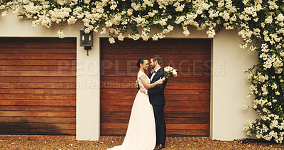 Buy stock photo Wedding, celebration and couple with hug outdoor for marriage commitment, milestone and loyalty. Relationship, happy people and embrace by home for ceremony, romance and union of love with promise