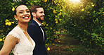 Walking, couple and smile for wedding, outdoor or romance for newlyweds, man and bonding with woman. Nature, bride and love for groom, portrait and happy for marriage, care and people with commitment