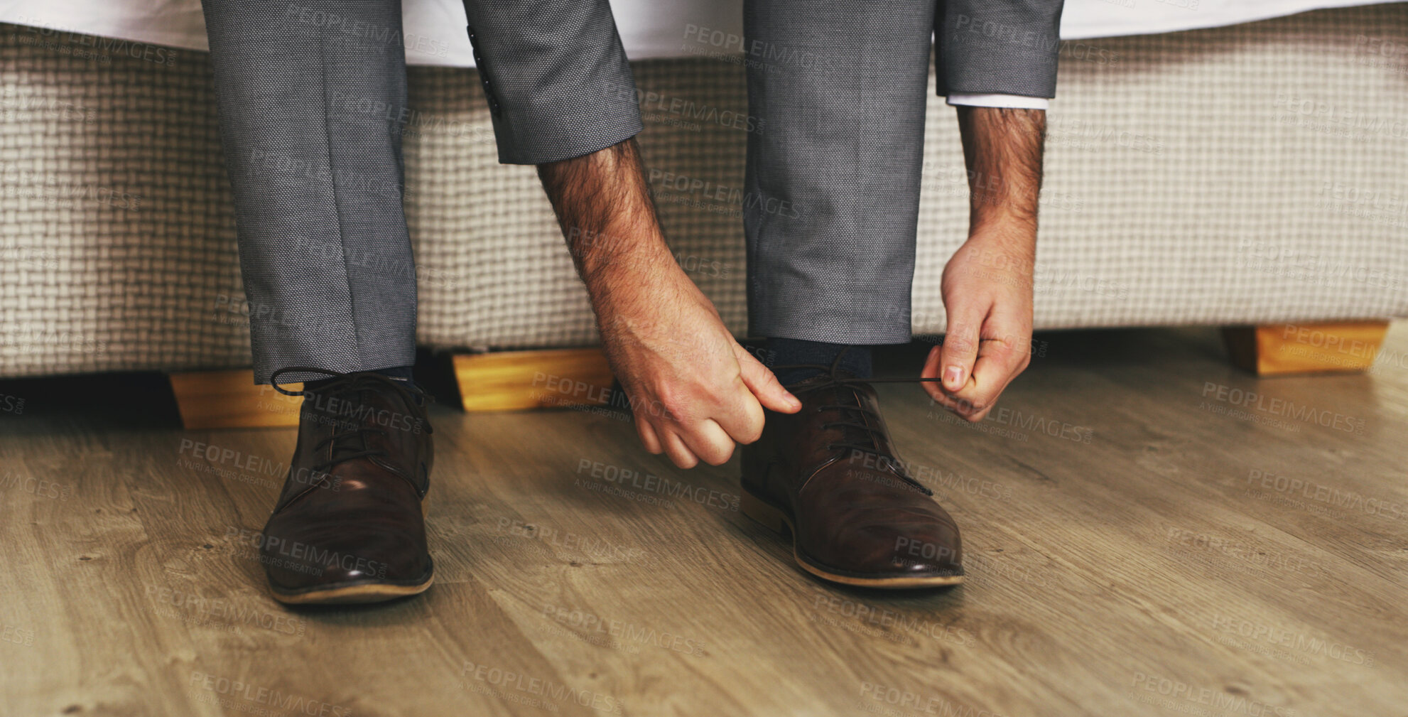 Buy stock photo Man, hands and tying shoes for fashion preparation, formal event or morning business at home. Male person, employee and tie with laces or leather for clothing style or getting ready for work at house