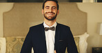 Portrait, smile and man in suit for wedding day, groom with happiness for marriage or formal ceremony. Tuxedo, bow tie and traditional outfit for commitment, confident with pride and ready for event