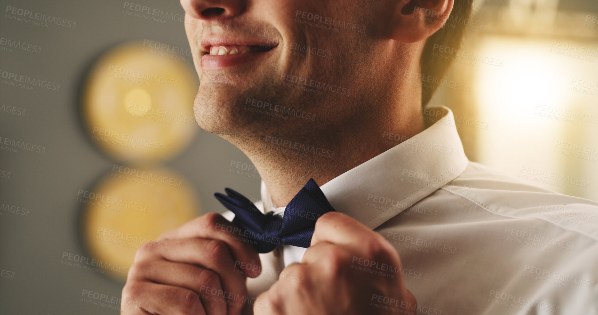 Buy stock photo Wedding, hands and groom getting ready with bow tie for marriage, ceremony and commitment. Happy, man and dressing in home with formal fashion for celebration, special day and preparation for event