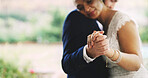 Dancing, couple and celebration for wedding, outdoor and people with love for commitment or romance. Embrace, man and bonding with woman on special day, space and together on weekend for marriage