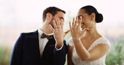 Buy stock photo Hands, rings and couple at wedding with love, connection or  relationship commitment together. Happy, loyalty and groom with bride at marriage ceremony with jewelry for partnership, trust or vow.