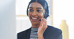 Call center, Indian woman and computer with headset for customer service, crm support and talking. Office, female person and business consultant with digital for discussion, sales information and faq