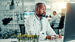 Scientist, lab and man on computer with plant sample for medical research, vaccine report and medicine. Healthcare, pharmaceutical and person on tech for study, medicinal analysis and digital results