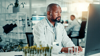 Buy stock photo Scientist, lab and man on computer with plant sample for medical research, vaccine report and medicine. Healthcare, pharmaceutical and person on tech for study, medicinal analysis and digital results