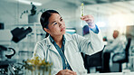 Test tube, plant and health with woman and research for climate change, biology or medical. Sustainability, science innovation and healthcare with scientist in laboratory for growth and study