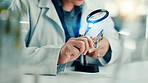 Magnifying glass, plant and science with hands of person for gene function, biology and medical research. Gmo editing, pharmacy innovation and cell regeneration with closeup of scientist for growth