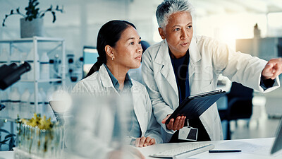 Buy stock photo Scientist team, tablet and research in laboratory for medical innovation, plant study or experiment. Biotechnology, people and pointing to results for sustainable medicine and environmental science