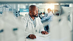 Computer, healthcare and science with black man in laboratory for online development or research. Medical, innovation and writing with scientist at desk for breakthrough, clinical trial or experiment