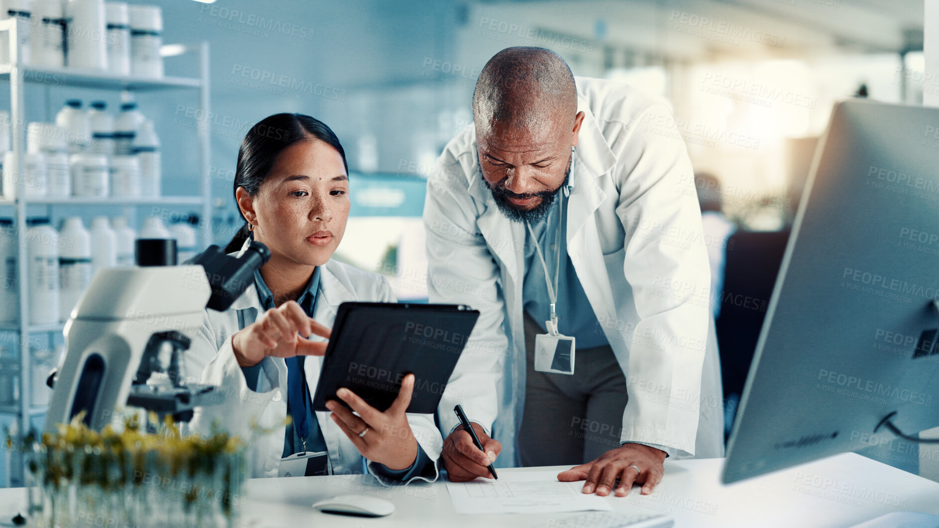 Buy stock photo Science, team and tablet with writing in lab for medical innovation, vaccine report and research. Scientist, people and digital app for pharmaceutical development, environmental study or test results