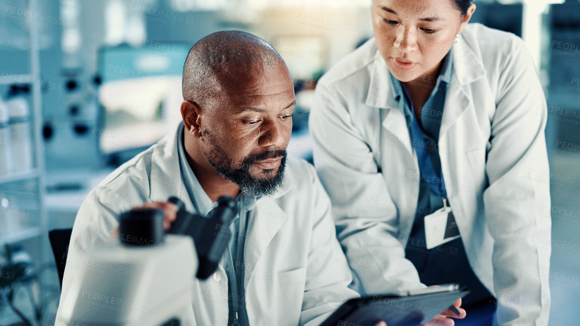 Buy stock photo Science, people and discussion with tablet in lab for medical research, vaccine report and review. Scientist, teamwork and reading results for pharmaceutical development, biotech study and innovation