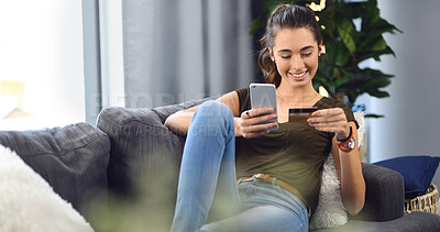 Buy stock photo Home, woman and smartphone with credit card for online shopping, banking app and password on sofa. House, female person and smile with mobile for debit pin, ecommerce and payment on couch in lounge