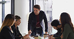 Business, man and meeting with staff in office for discussion, planning and teamwork for finance review. Manager, people and brainstorming with ideas, investment proposal and collaboration for budget