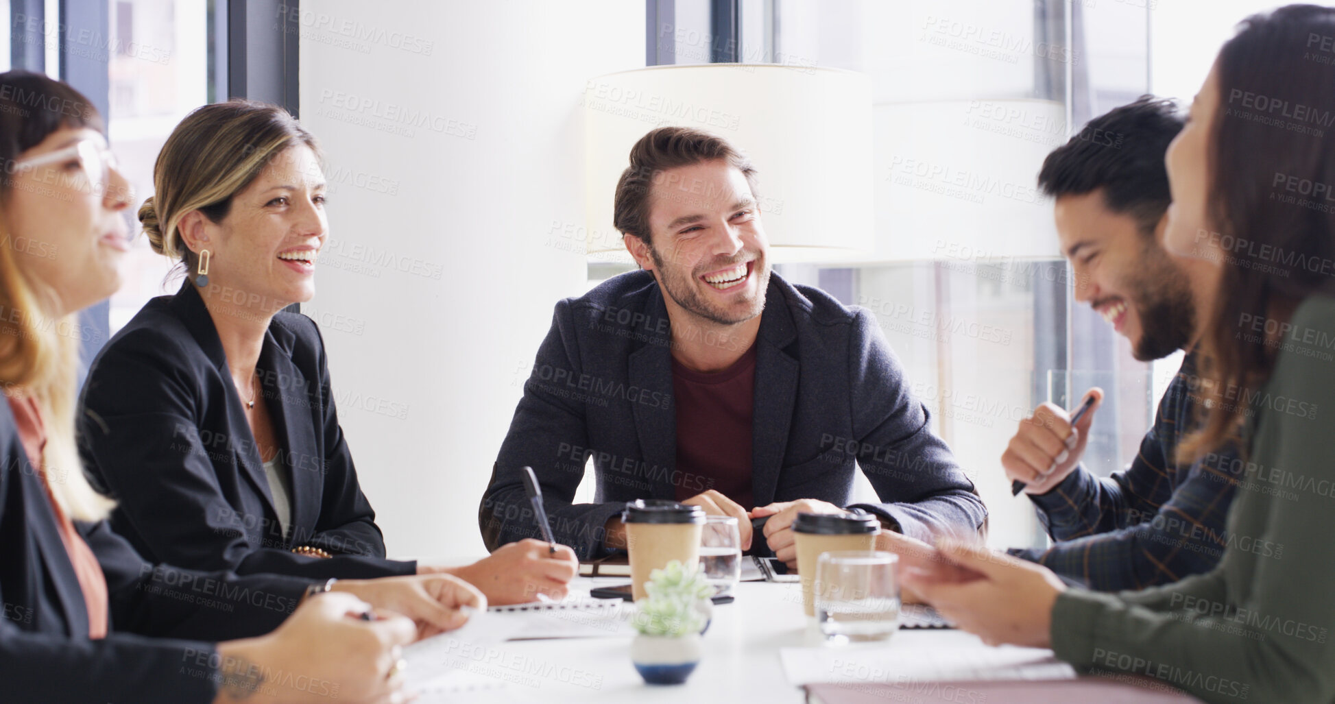 Buy stock photo Man, group and meeting with discussion in office with notes, planning or strategy at media company. People, journalist and editor with problem solving, happy and team with feedback at startup agency