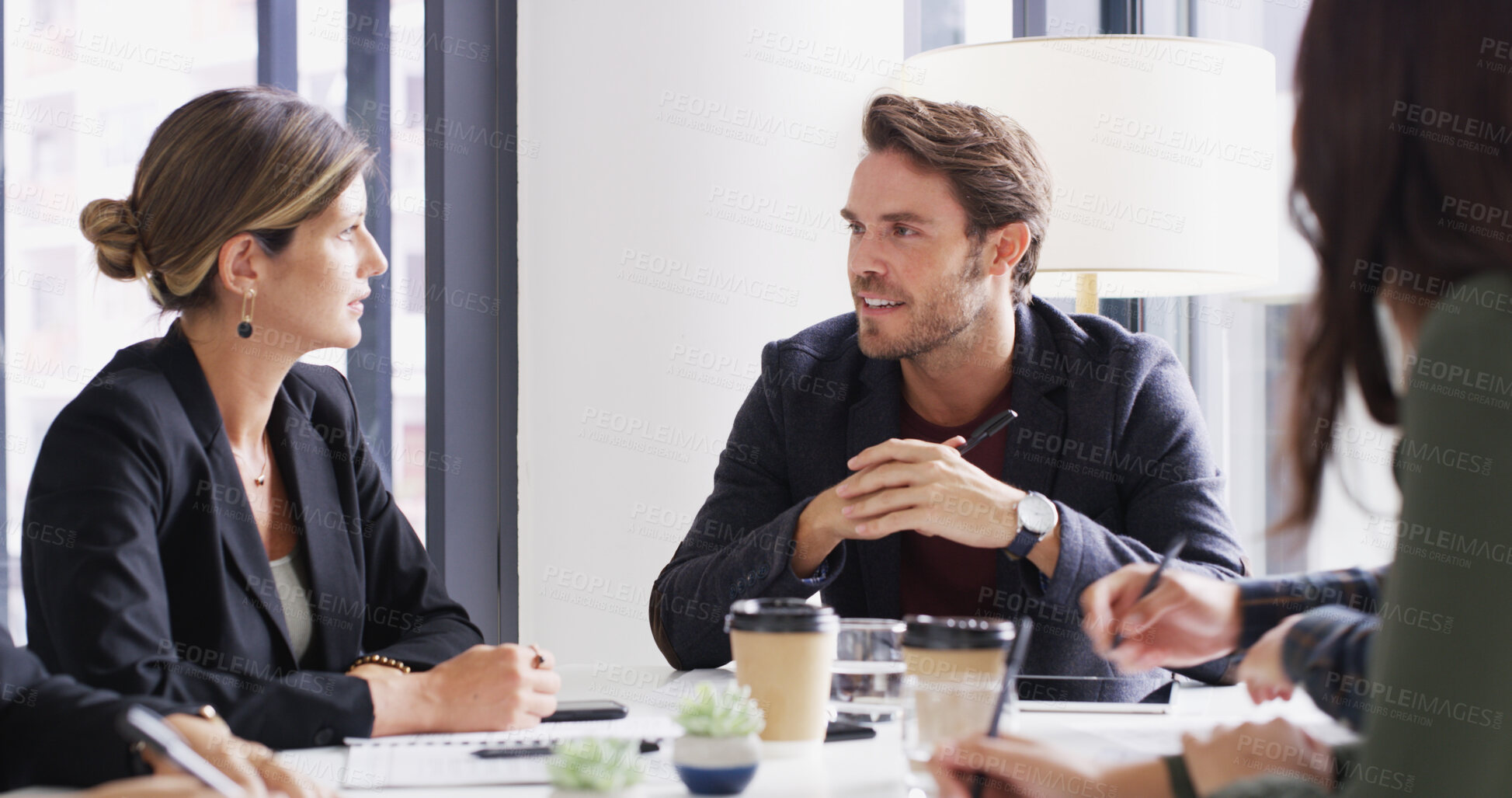 Buy stock photo Man, group and meeting with talking in office with agenda, happy and strategy at media company. People, journalist and editor with problem solving, review and team with feedback for project at agency