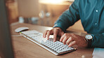 Hands, business and man in office, keyboard and copywriting with connection, editing and internet. Person, closeup and journalist in workplace, pc and research for article, creative or proofreading