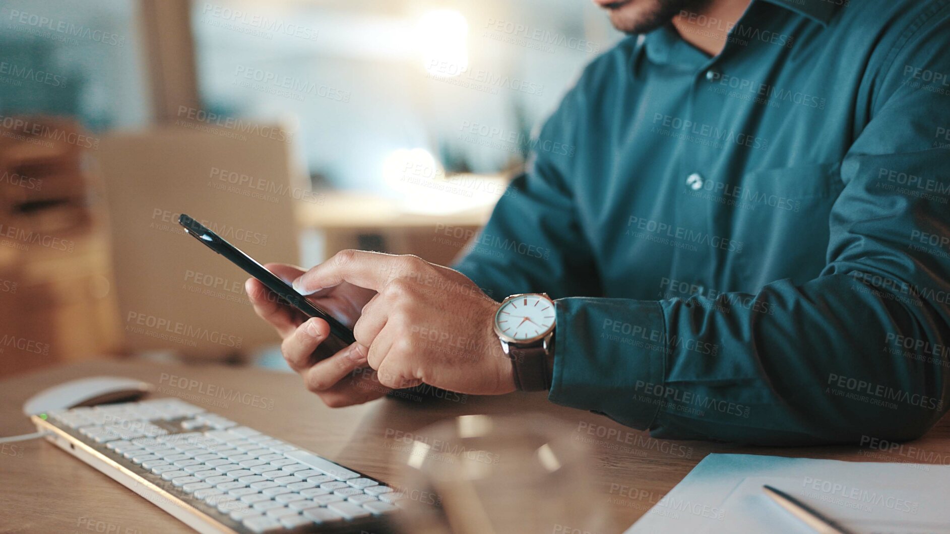 Buy stock photo Business, hands and man with phone in office for checking schedule, mobile chat or email response. Professional, employee or scroll on smartphone for calendar update, communication or online research