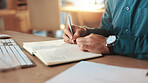 Business person, hands or writing with book at night for reminder, schedule or notes at office desk. Closeup, employee or journalist working late with pen in notebook for diary ideas, agenda or tasks