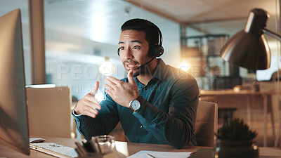 Buy stock photo Computer, contact us and explain with man in call center for assistance, help or support at night. Communication, headset and solution with person at office for online customer service in evening