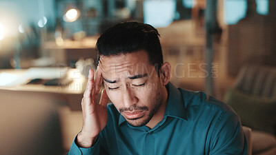 Buy stock photo Night, business and man in office, headache and burnout with deadline, pressure and writer. Evening, person and journalist in workplace, migraine and tension with pain, stress and tired with fatigue