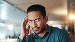 Night, business and man in workplace, headache and burnout with deadline, fatigue and writer. Evening, person and journalist with migraine, illness or tension with pain, stress or tired with pressure