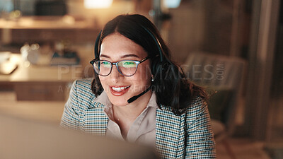 Buy stock photo Computer, headset and smile with woman in call center for assistance, help or support at night. Communication, contact us and solution with happy person at office for customer service in evening