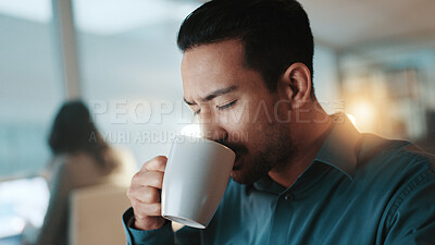 Buy stock photo Night, business and man in office, drinking coffee and copywriting with deadline for article. Person, evening and journalist in workplace, cappuccino and caffeine for low energy, tea and creativity
