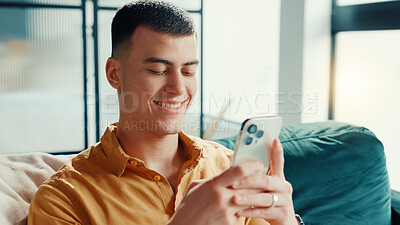 Buy stock photo Phone, relax and weekend with man on sofa in living room of home for break or internet browsing. App, social media and text message with happy person in apartment for communication or search