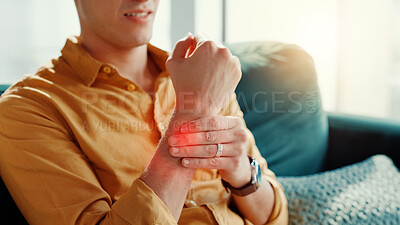 Buy stock photo Home, wrist pain and man on couch, hands or inflammation with stress, arthritis or pressure. Red highlight, closeup or person with muscle tension, mobility or carpal tunnel syndrome with joint injury