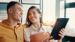Happy, couple and relax with tablet at house for social media, browsing internet and bonding. People, laugh and digital for streaming online, search movie and app subscription for film entertainment