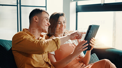 Buy stock photo Happy, couple and pointing on tablet at house for social media, browsing internet and bonding. Smile, people and digital for streaming online, search movie and app subscription for film entertainment