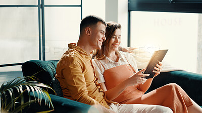 Buy stock photo Smile, couple and relax with tablet at house for social media, browsing internet and bonding. Happy, people and digital for streaming online, search movie and app subscription for film entertainment
