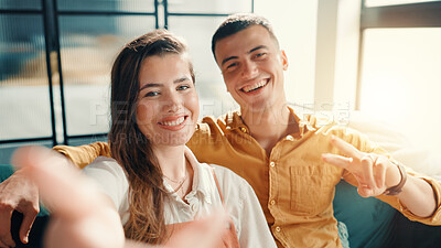 Buy stock photo Selfie, happy and portrait of couple on sofa in home for relax with memory or social media post. Smile, peace sign and man with woman for photography picture together in living room at apartment.